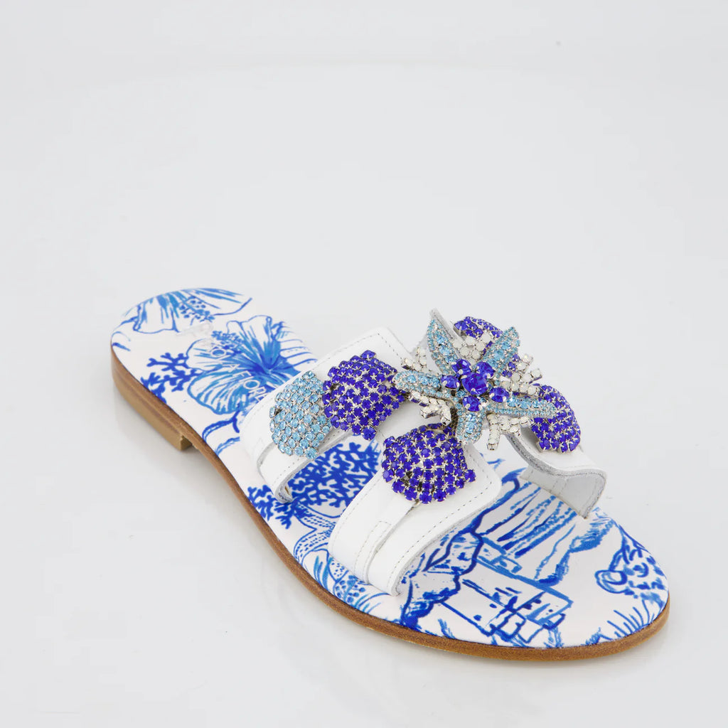 Sandalo stampa blu con accessorio stella e conchiglie
