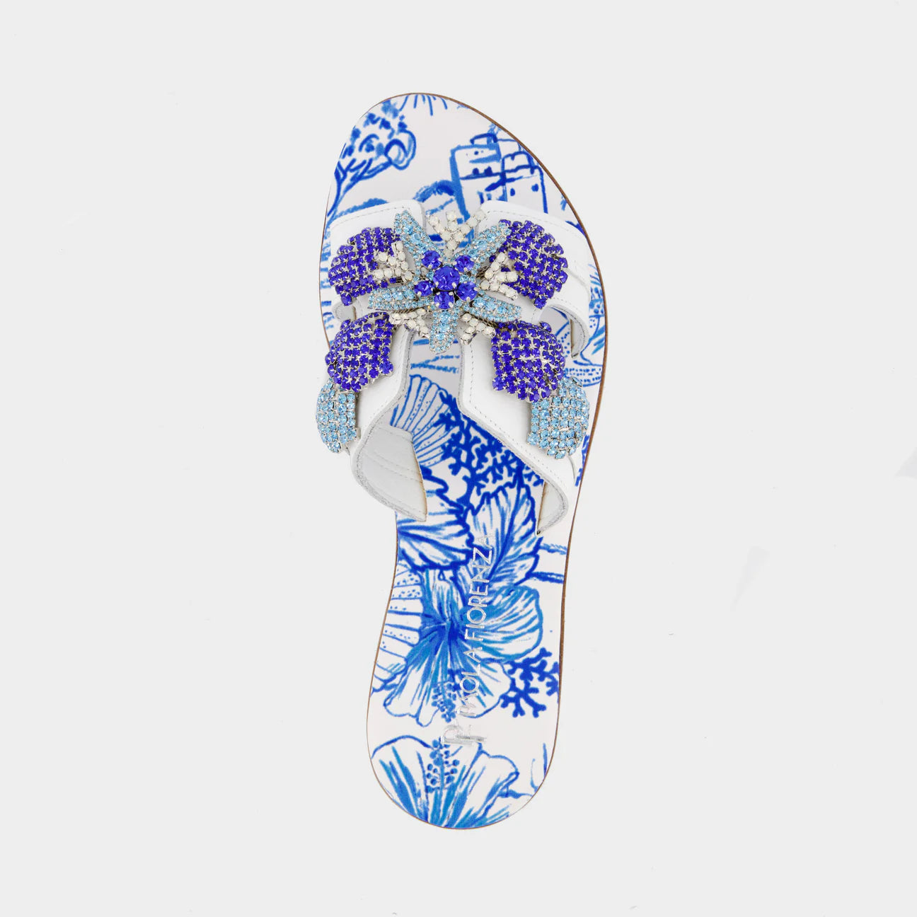 Sandalo stampa blu con accessorio stella e conchiglie